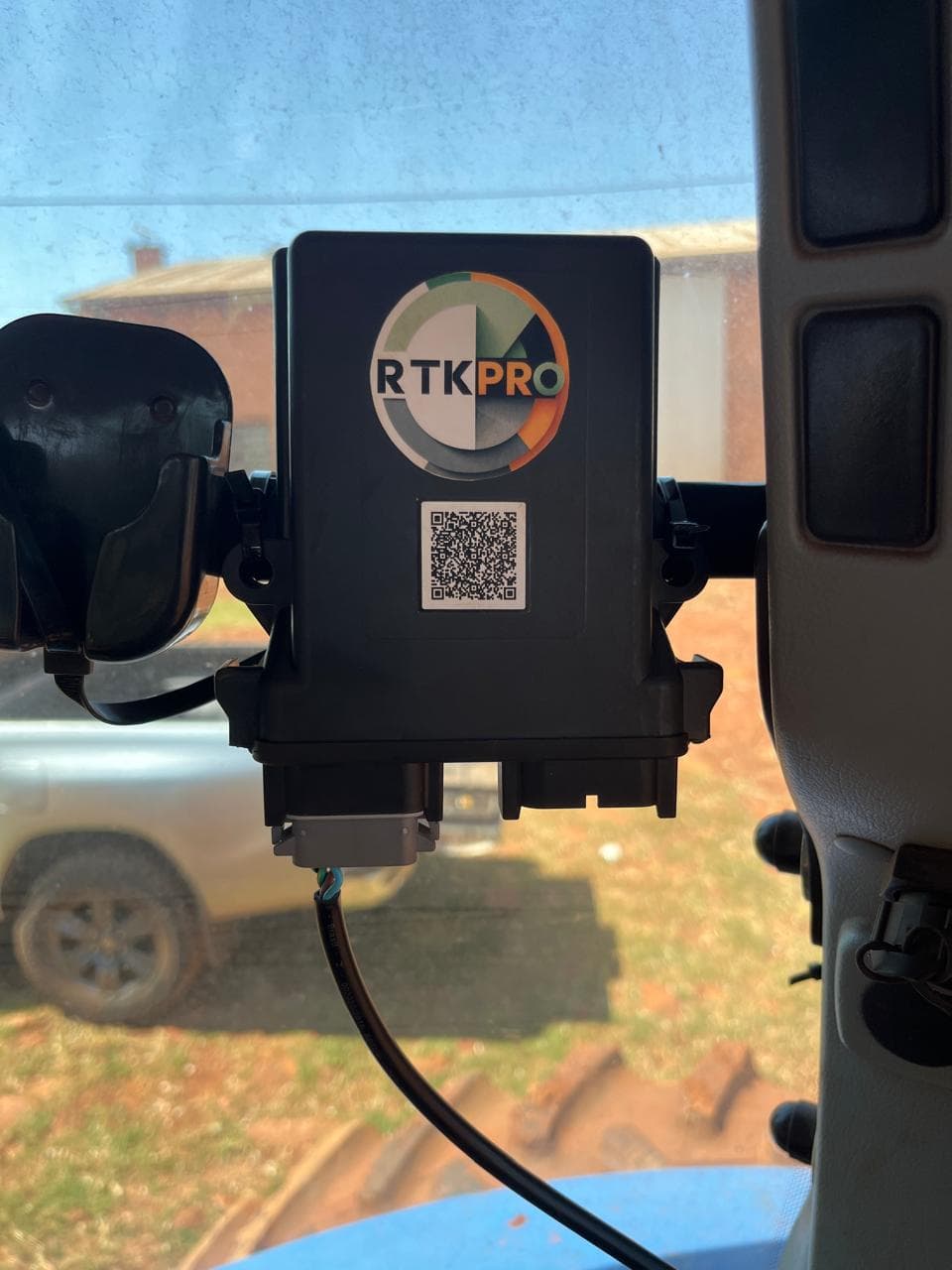 RTK PRO module installed in a tractor cab